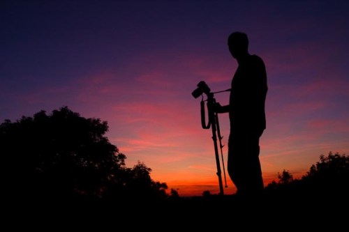 Another silhouette of Graham with his camera.